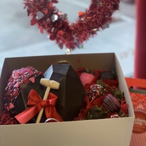 Breakable dark chocolate heart with assorted candy