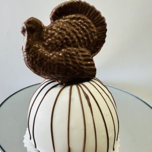 White chocolate caramel apple with turkey topper